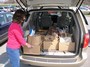 Mary Potter loaded with 10 boxes of food donations and ready to roll.
